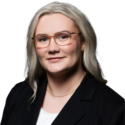 Holly, a family and divorce lawyer at Rafton Family Lawyers in Sydney, wearing glasses and a black blazer, smiling confidently.