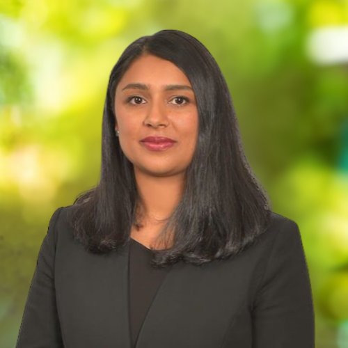 Professional portrait of a woman in a blazer, representing Rafton Family Lawyers, a trusted provider of family and divorce legal services in Sydney.